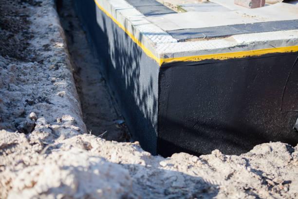 Professional Exterior Waterproofing technician working in Goddard, KS